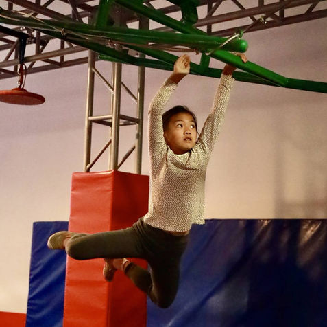 Boy jumping in the air