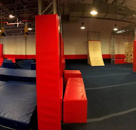 Wide view of play structure in gym